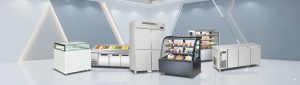 Showcase of commercial kitchen and restaurant refrigeration units, featuring glass display cases, stainless steel freezers, and food prep stations.