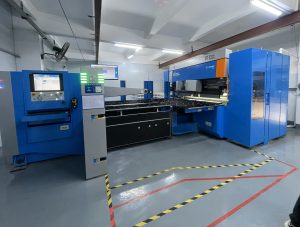 Advanced Prima Power BCe Smart panel bender operating in a clean manufacturing facility for precise automated sheet metal bending